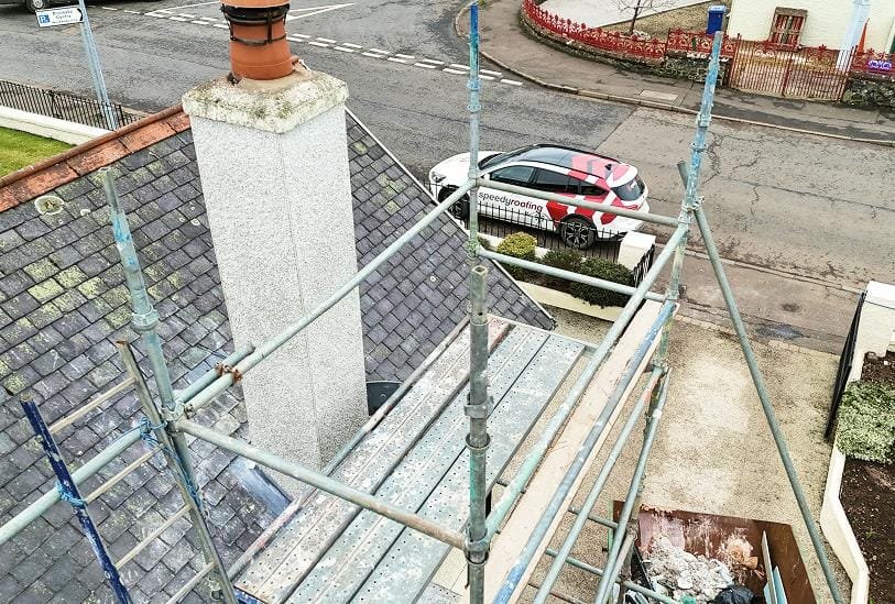 Roofing Services Scotland - Roof repairs being carried out by Speedy Roofing with the company van visible in the background, serving homes across Scotland.