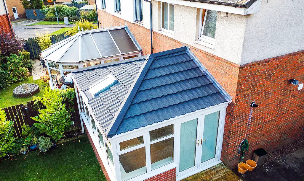 Solid conservatory roof eliminating rain noise — Glasgow installation