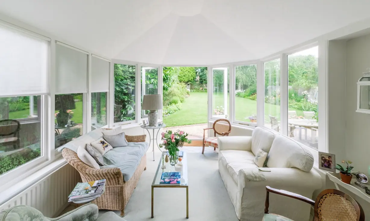 Conservatory interior transformed into a year-round living room